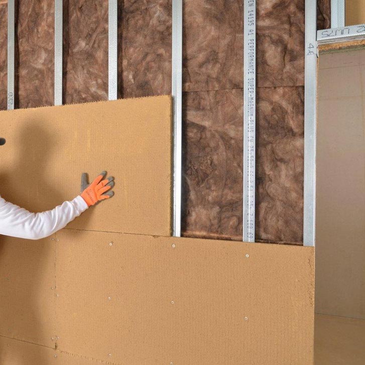 Wood fiber FiberTherm Isorel installation on walls
